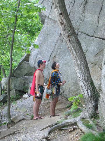 Superheros sizing up climbs in the Nears